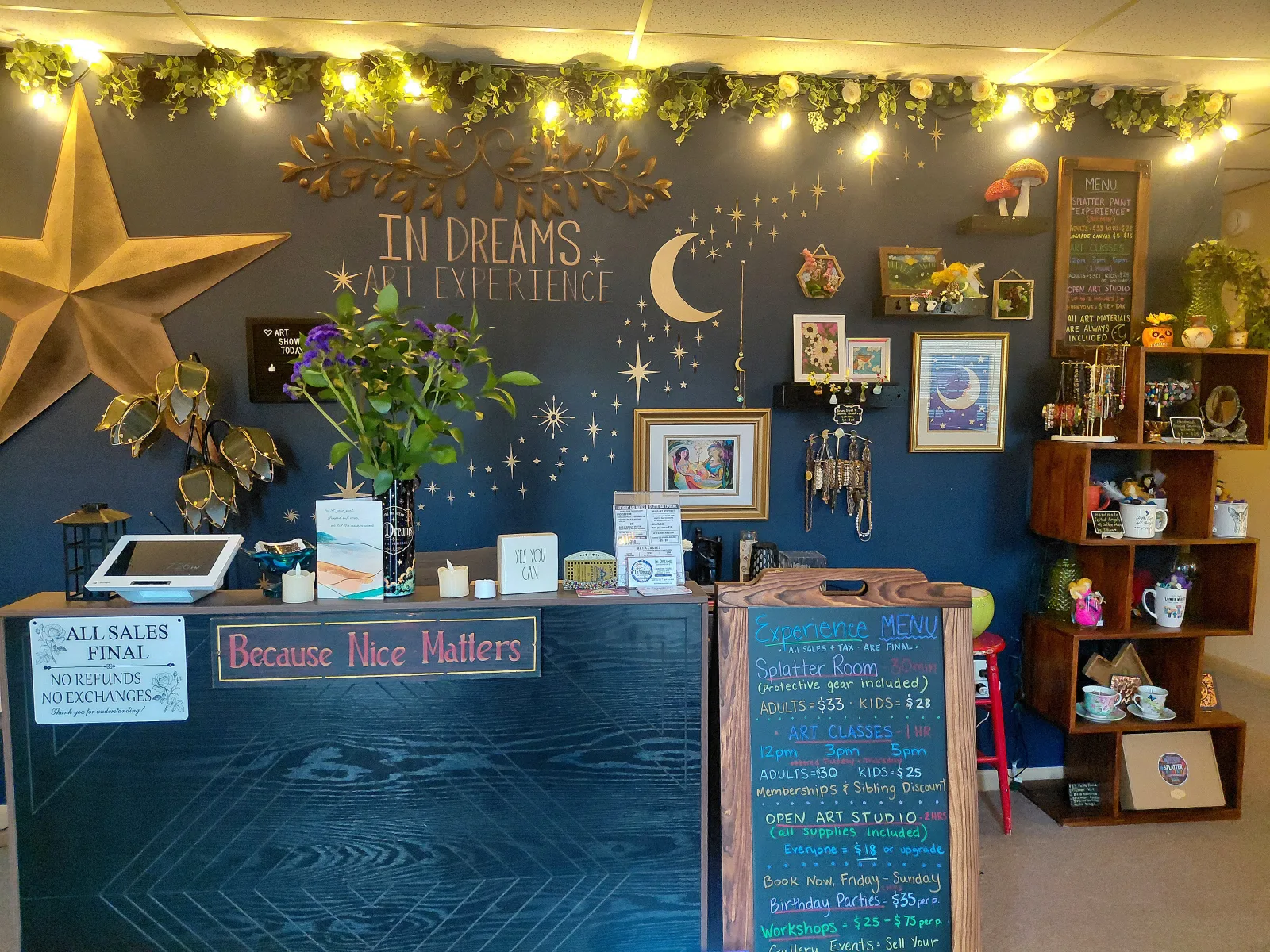 Front lobby with the InDreams Art Experience wall and welcome counter in Medford, NJ