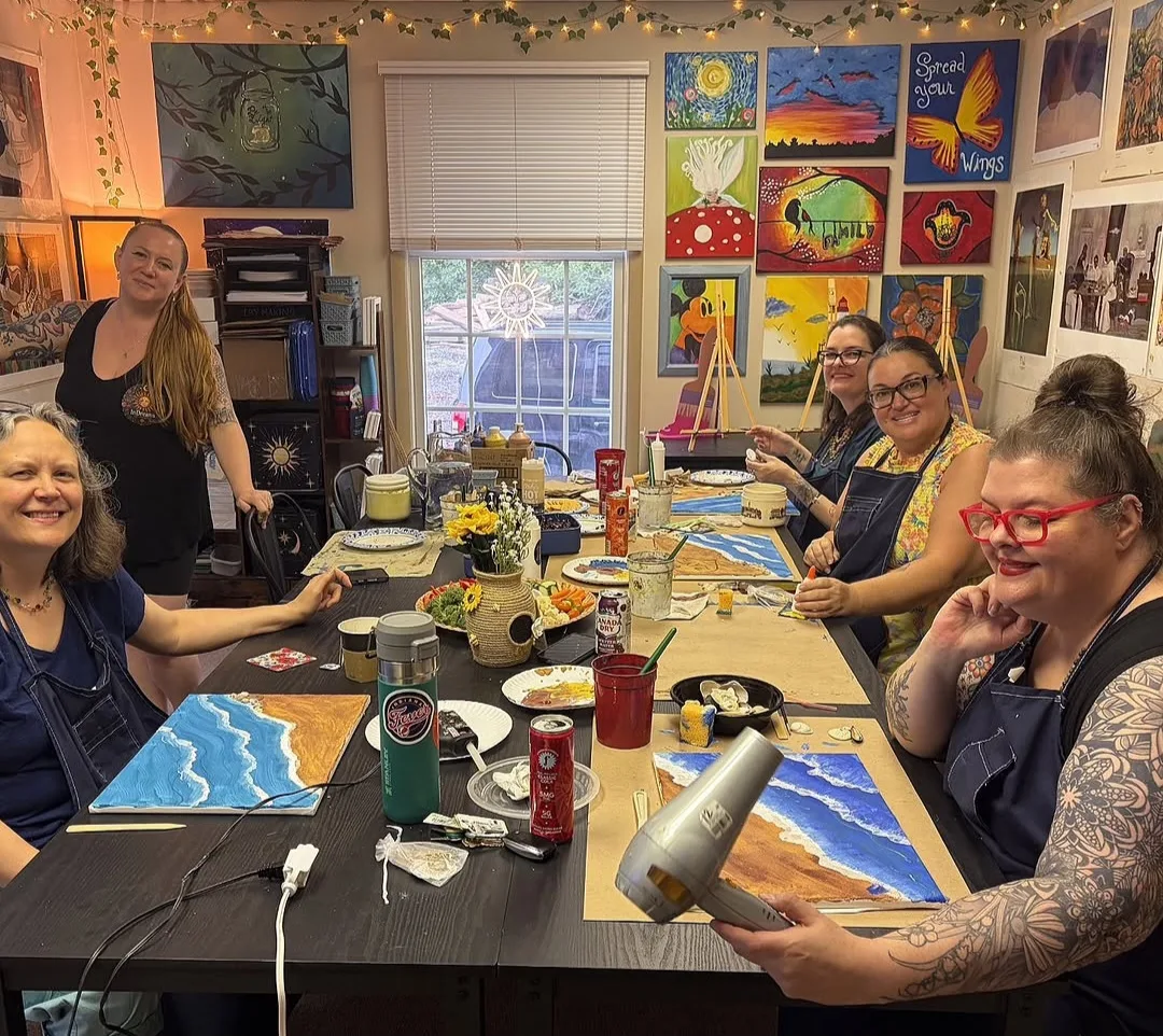 Guests painting together during a private paint party at InDreams Art Experience