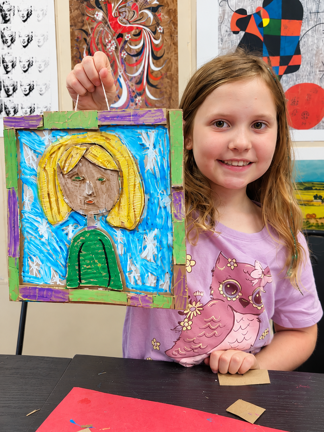Students of different ages working side by side at the bead and jewelry table during an art class at InDreams Art Experience in Medford, NJ